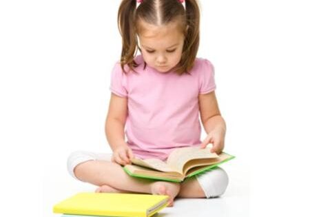 child care girl reading book learning